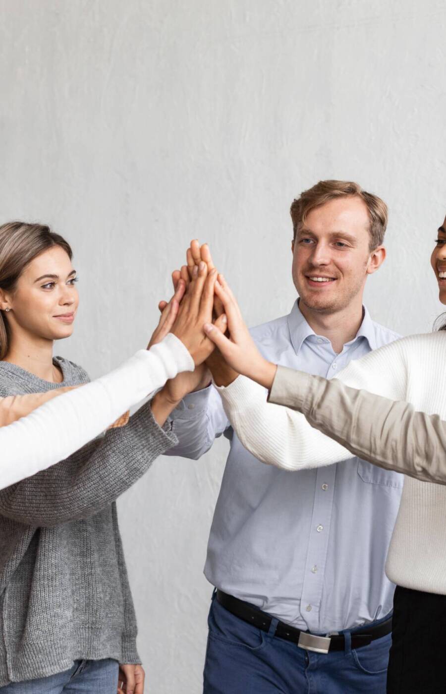 smiley-people-high-fiving-each-other-group-therapy-session